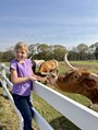 My neighbor friend visiting longhorns